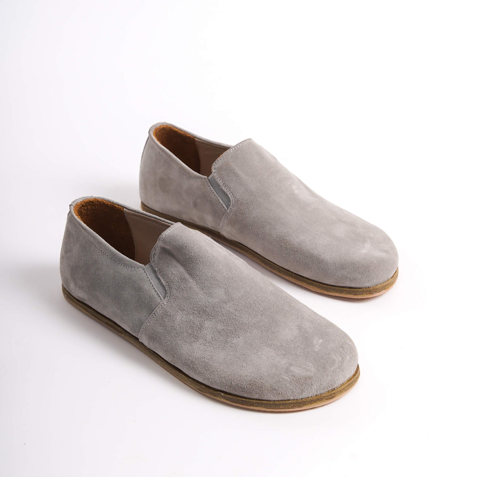 Gray Suede Ionia Leather Barefoot Men's Loafers on white background, showcasing the minimalist design.