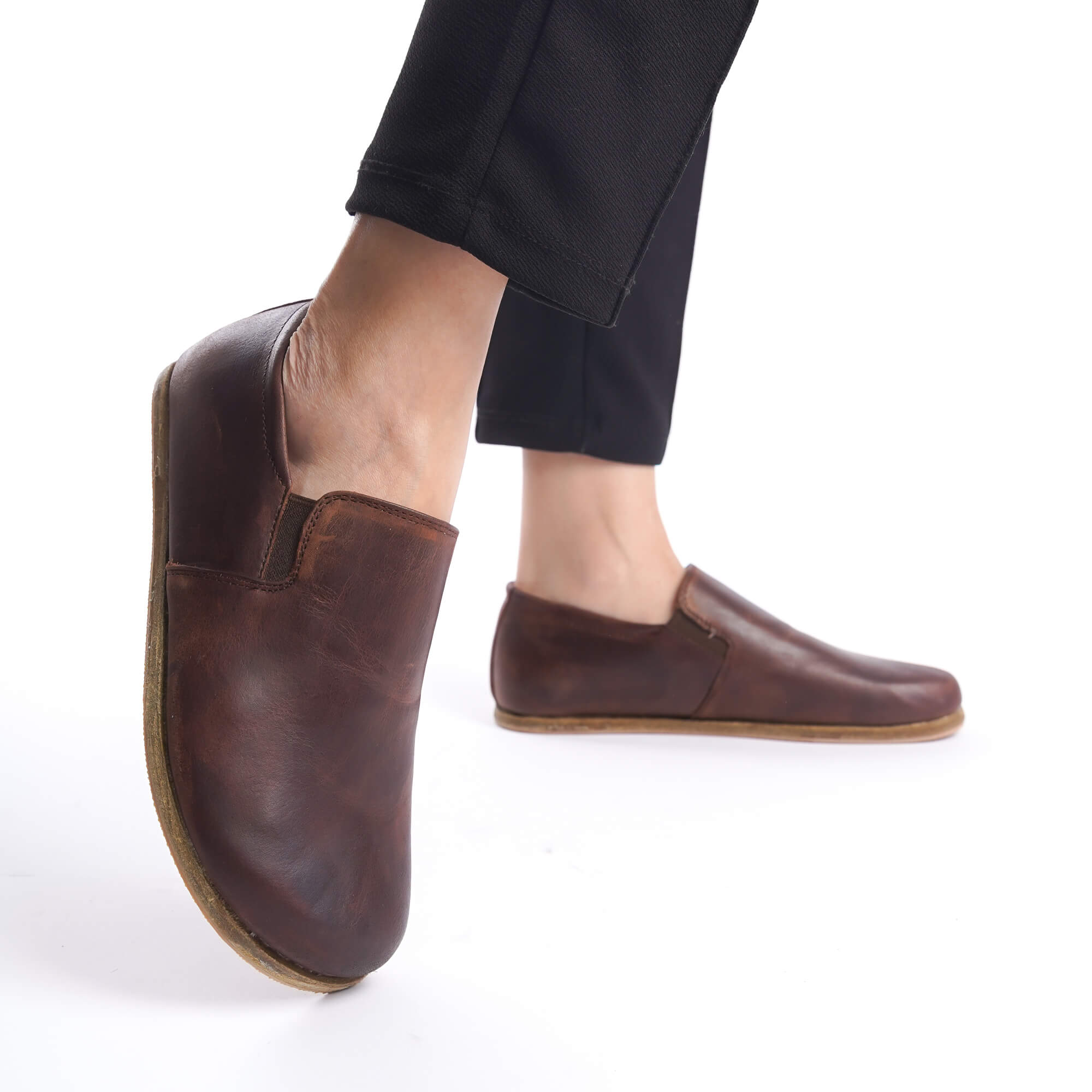 Close-up of Ionia Leather Barefoot Women Loafers in brown, showcasing the flexible and natural design.
