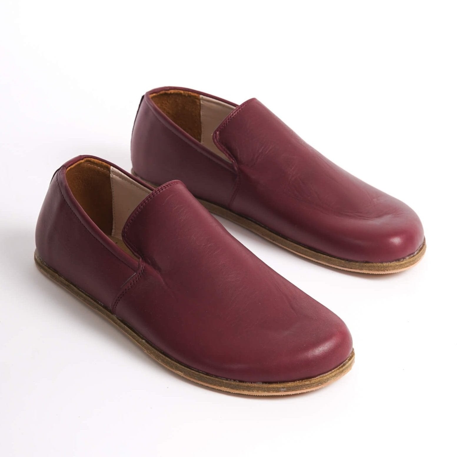 Stylish burgundy Aeolia leather barefoot men's loafers from Pelanir, showcasing minimalist design and comfort. Discover more at pelanir.com!