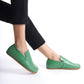 Aeolia green leather barefoot women loafers, paired with black pants, featuring a minimalist and comfortable design.