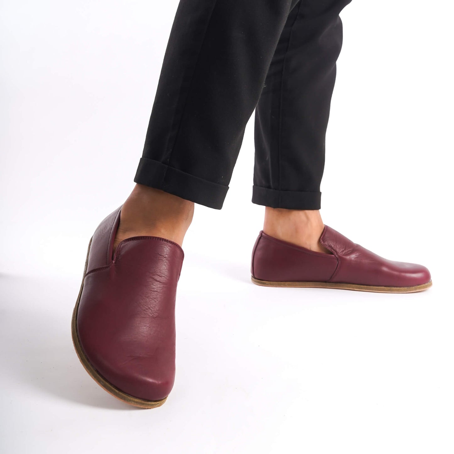 Side view of Burgundy Aeolia Leather Barefoot Men's Loafers, demonstrating the wide toe box and minimalist design.