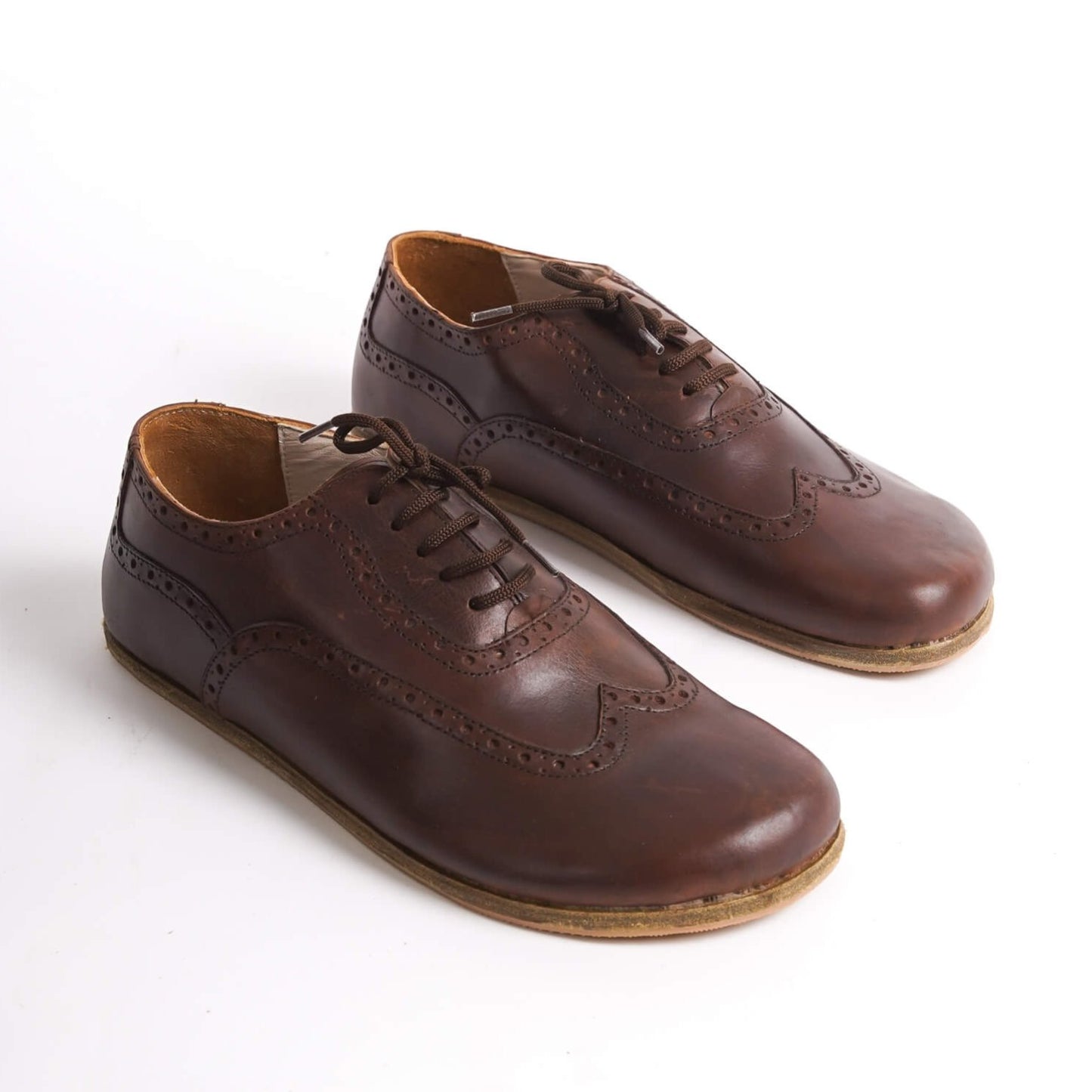 Classic brown Doris Leather Barefoot Men's Oxfords with intricate brogue detailing and zero-drop sole for natural foot movement.