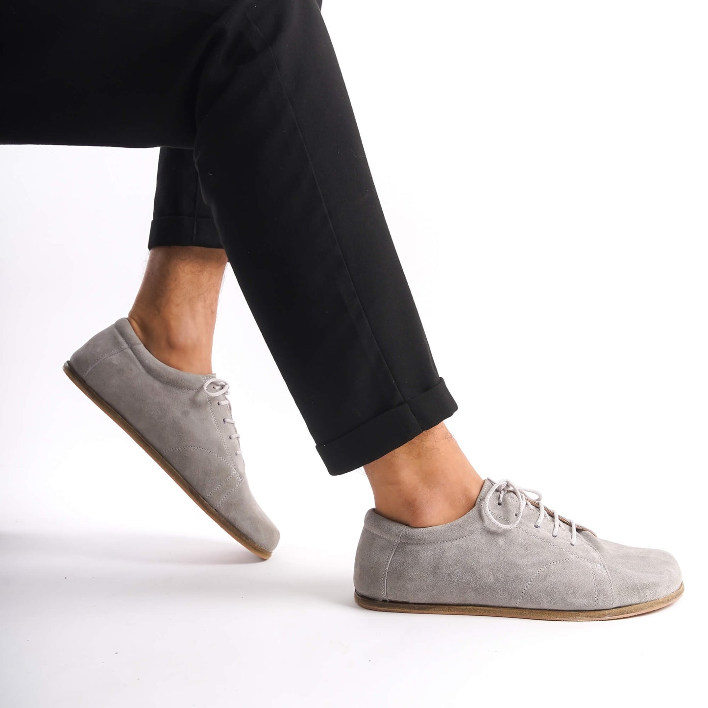 Comfortable gray suede men's barefoot sneakers, featuring minimalist design and zero-drop sole.