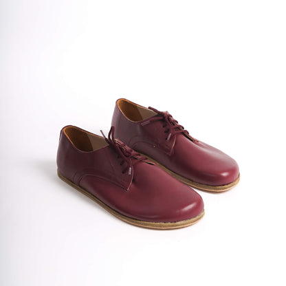 Locris Leather Barefoot Men's Oxfords in burgundy, displayed side by side, highlighting their rich color and genuine leather.