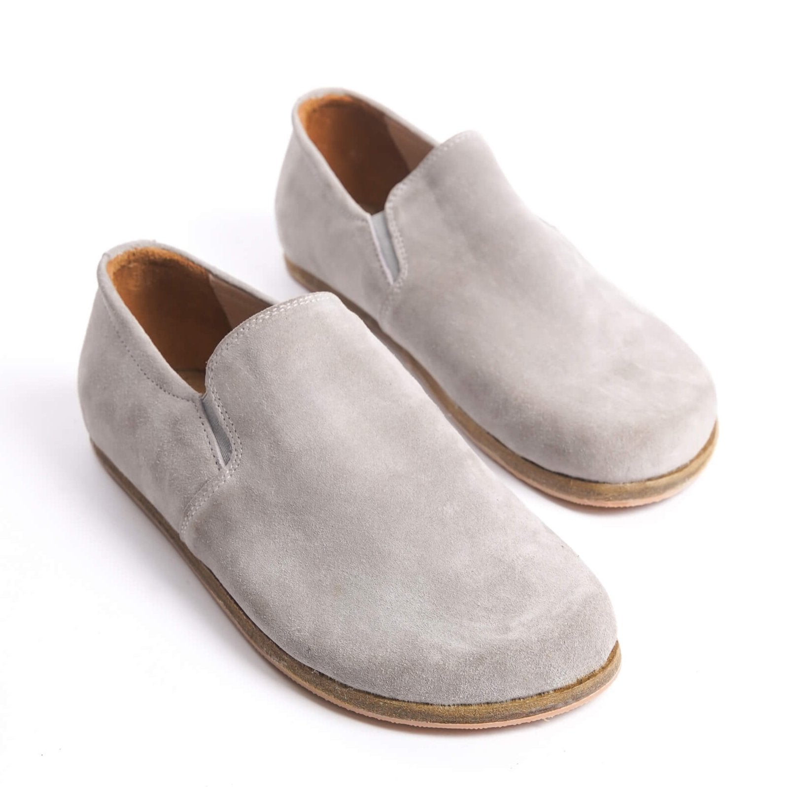 Gray suede Ionia leather barefoot women loafers, minimalist design with a natural fit, front view.