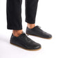 Close-up of black Doris Leather Barefoot Men's Oxfords, showcasing high-quality leather and classic wingtip design.