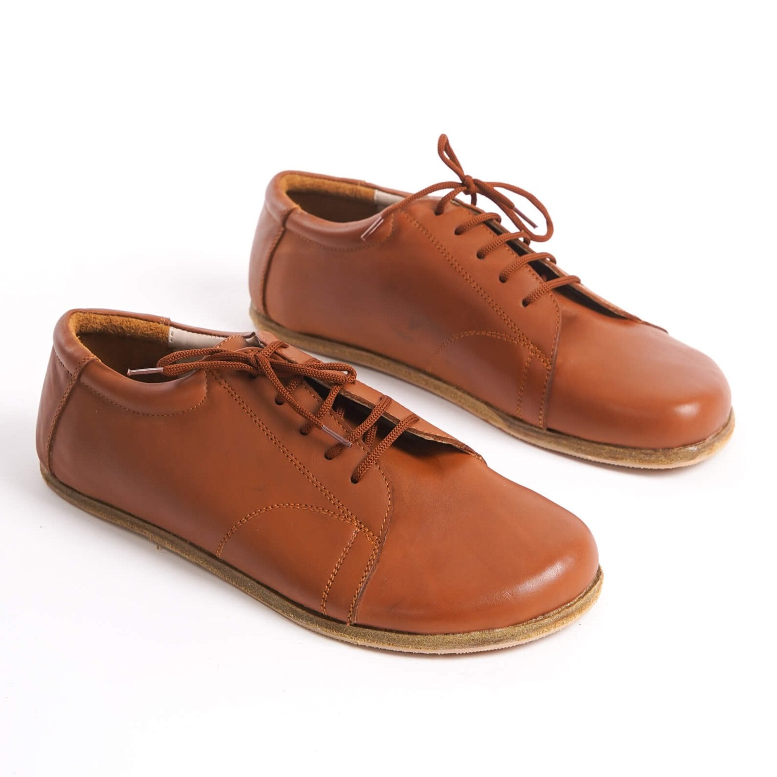 Tan brown Lydia Leather Barefoot Men's Sneakers with genuine leather and zero-drop design for natural foot movement.