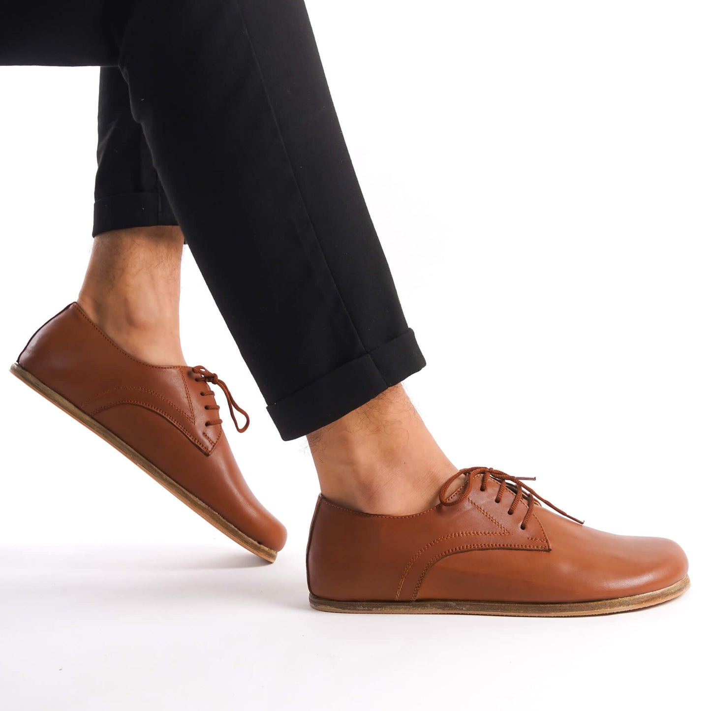 Close-up of Locris Leather Barefoot Men's Oxfords in tan brown, featuring genuine leather and minimalist design.