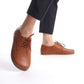 Side view of Locris Tan Brown Leather Barefoot Women Oxfords on a model, highlighting lightweight and flexible sole.