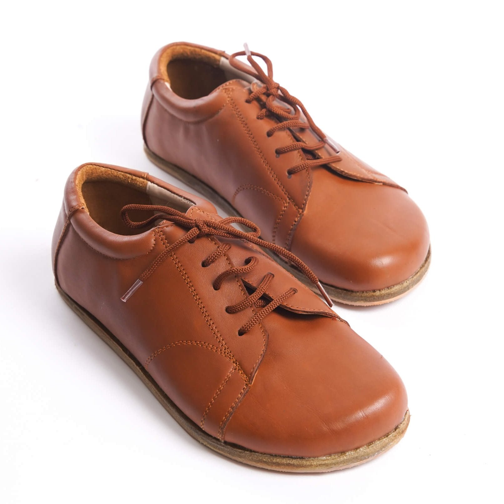 Lydia Leather Barefoot Women's Sneakers in Tan Brown, showcasing the classic and stylish design with genuine leather material.