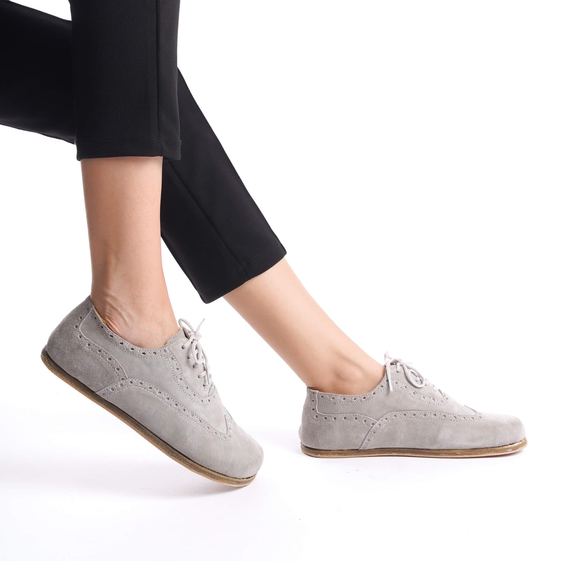 Side view of gray Doris leather barefoot women's oxfords, highlighting the zero-drop design and natural fit.