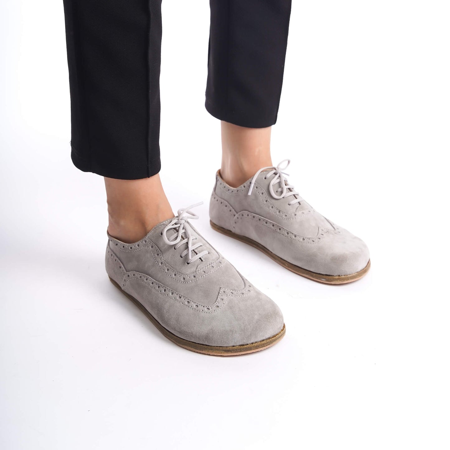 Close-up of gray Doris leather barefoot women Oxfords, highlighting the lace-up design and detailed stitching.