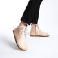 Durable beige barefoot ankle boots with lace details, ideal for both everyday and active use.