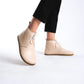 Versatile beige barefoot ankle boots, blending style and comfort effortlessly.