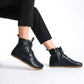 Chic black barefoot boots featuring a minimalist style, designed for comfort and flexibility.