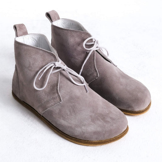 Stylish gray barefoot ankle boots with a minimalist design, perfect for comfort.