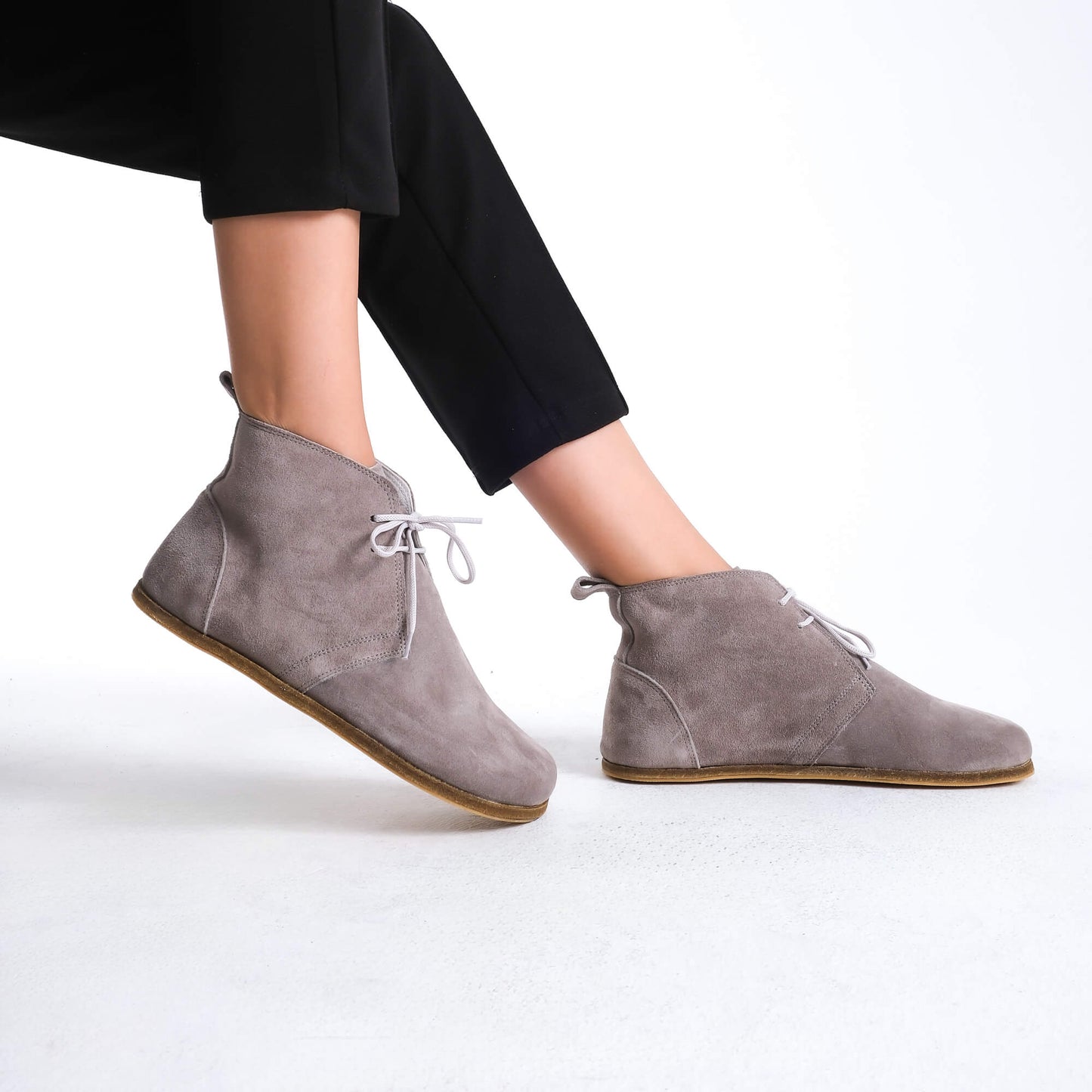 Versatile gray barefoot ankle boots, blending style and comfort effortlessly.