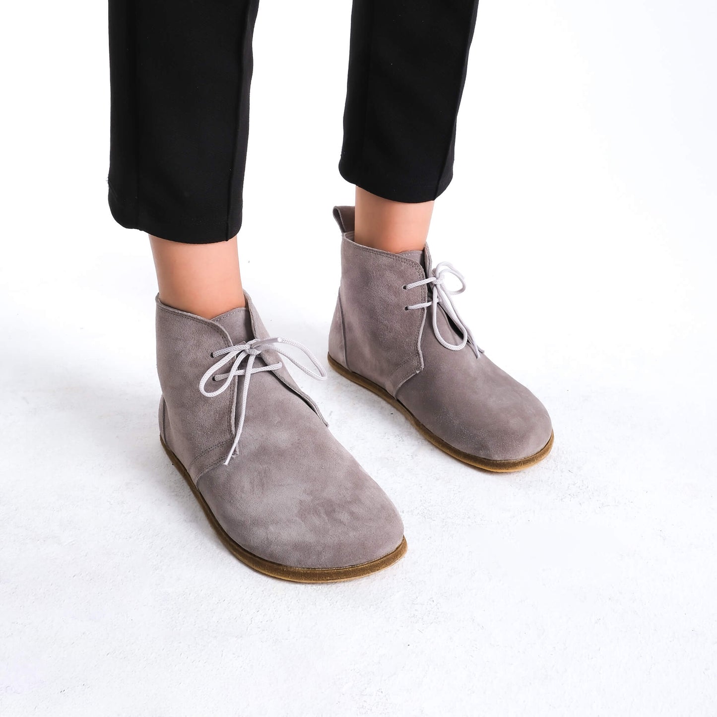 Premium gray barefoot boots showcasing a sleek design for a modern aesthetic.