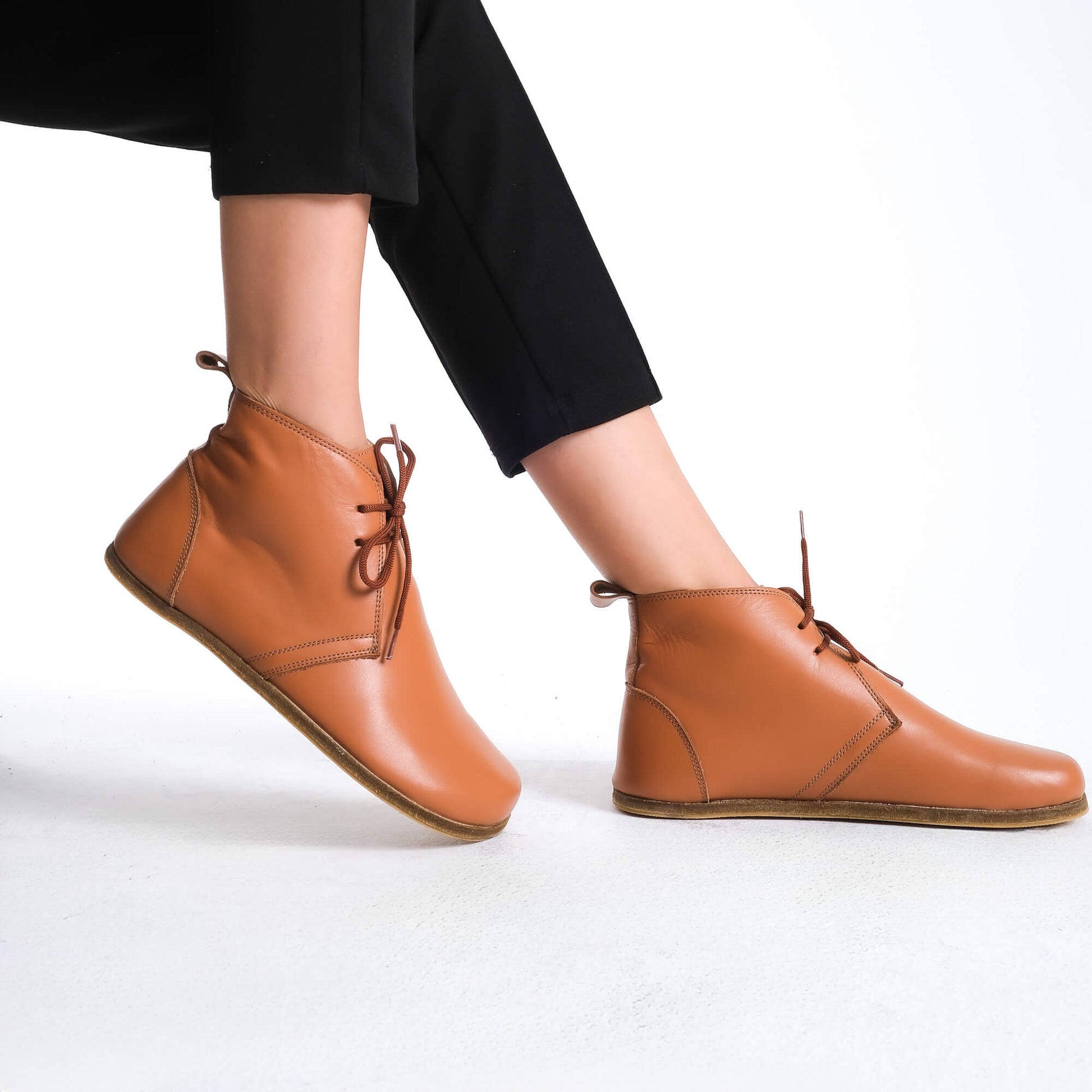 Chic tan brown barefoot boots, designed for natural walking and everyday wear.