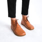 Premium tan brown barefoot boots showcasing a sleek design for a modern aesthetic.