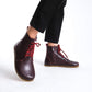 Durable burgundy barefoot ankle boots with lace details, ideal for both everyday and active use.