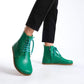 Premium green leather barefoot boots showcasing a contemporary design for a polished look.