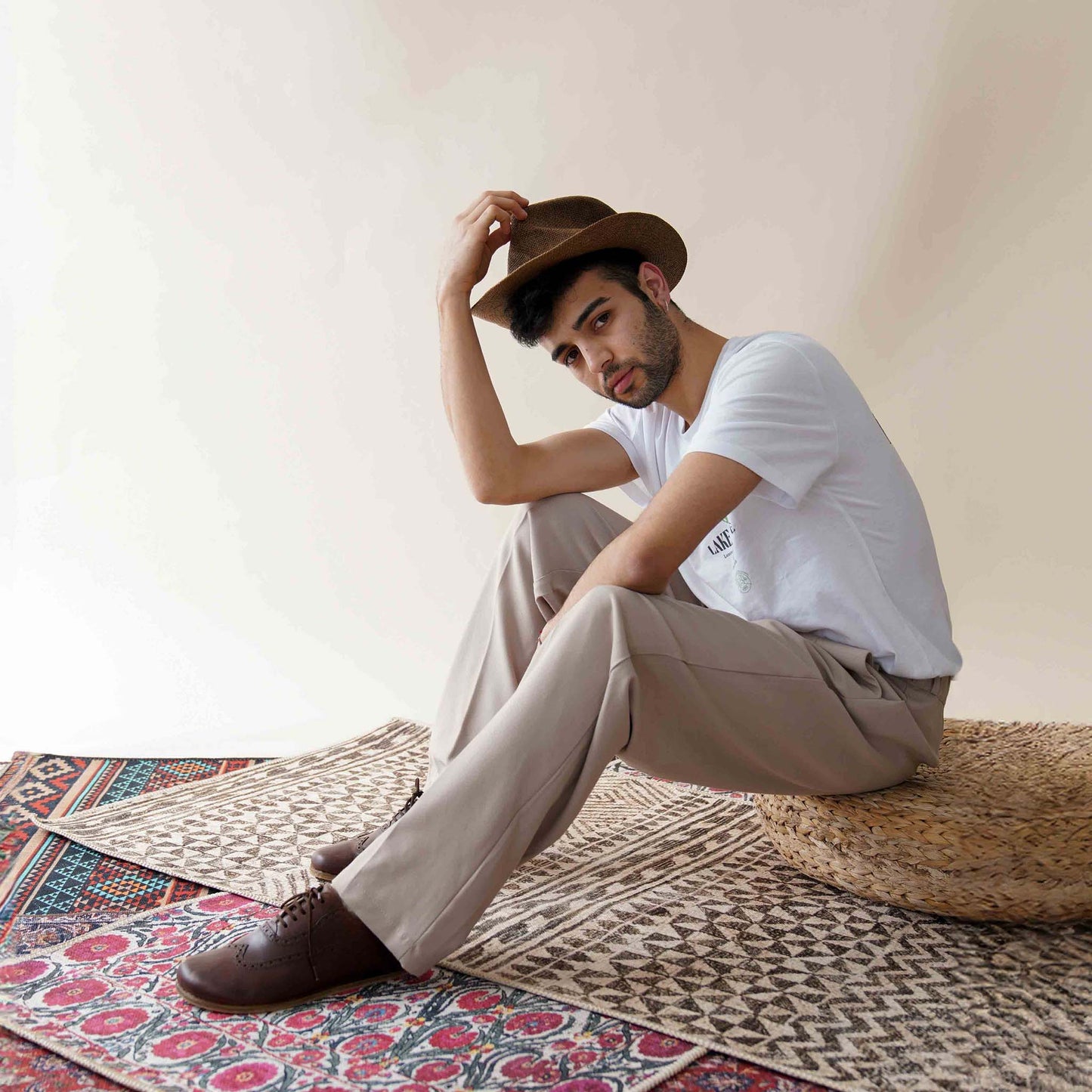 Man wearing brown Doris Leather Barefoot Men's Oxfords, featuring a stylish and comfortable look.