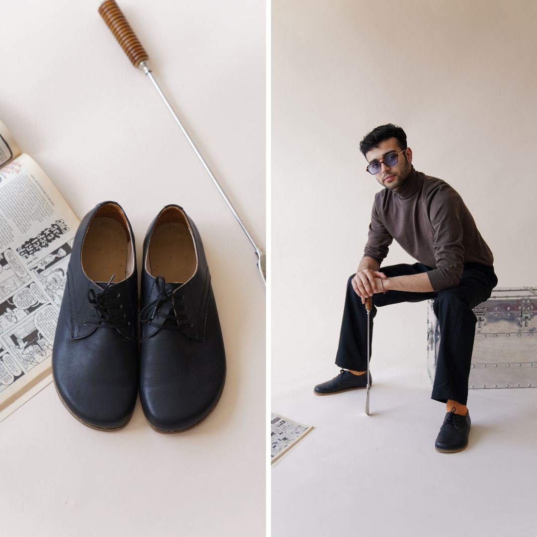 Stylish man wearing Locris black barefoot oxfords, modern minimalist look"